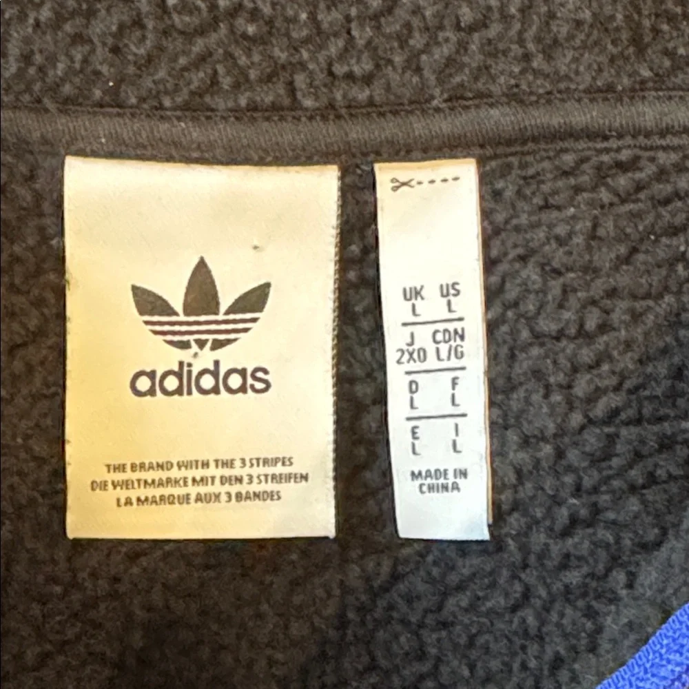 Adidas Adventure Black Hoodie with Blue‎ Patch
